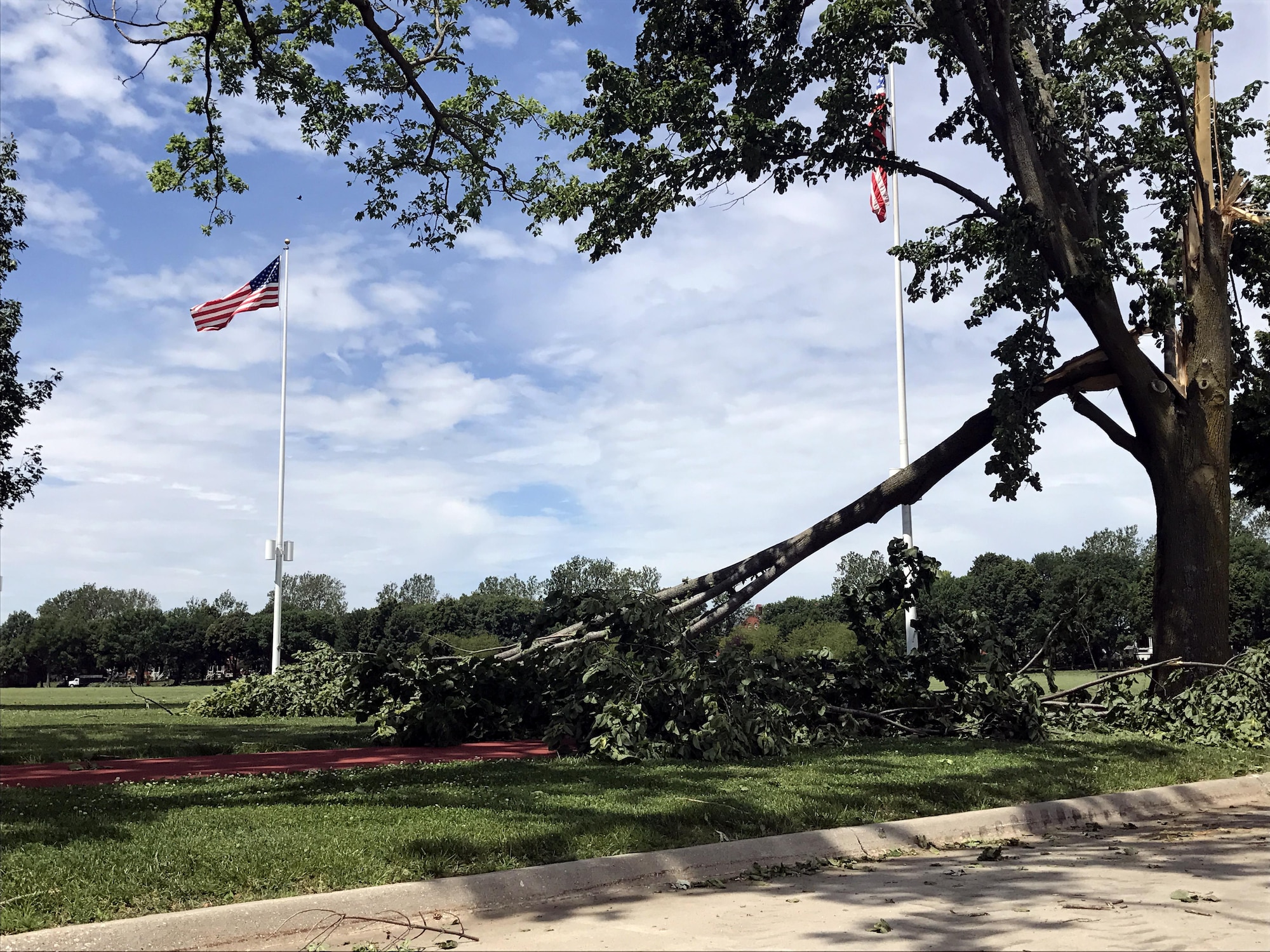 Multiple trees and power lines were downed during a major storm on June 16. Property damage occurred to various facilities, homes and some aircraft, but no base personnel were injured. (55th Wing Public Affairs Photo)