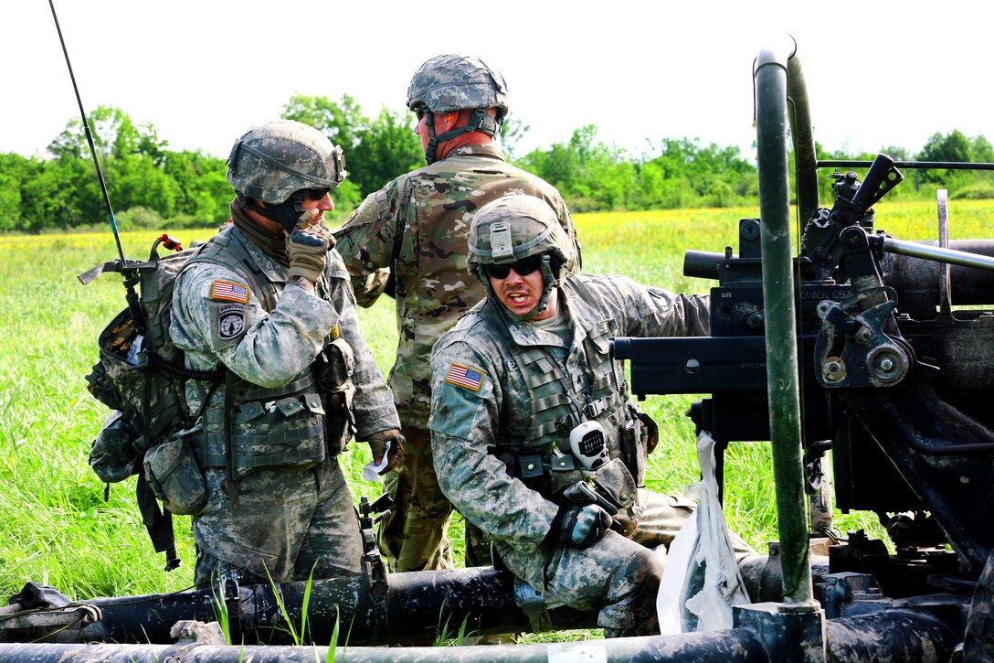 New York Army National Guardsmen prepare to fire an M119A2 105mm howitzer during an air assault artillery raid at Fort Drum, N.Y., June 9, 2017. Army photo by Sgt. Alexander Rector