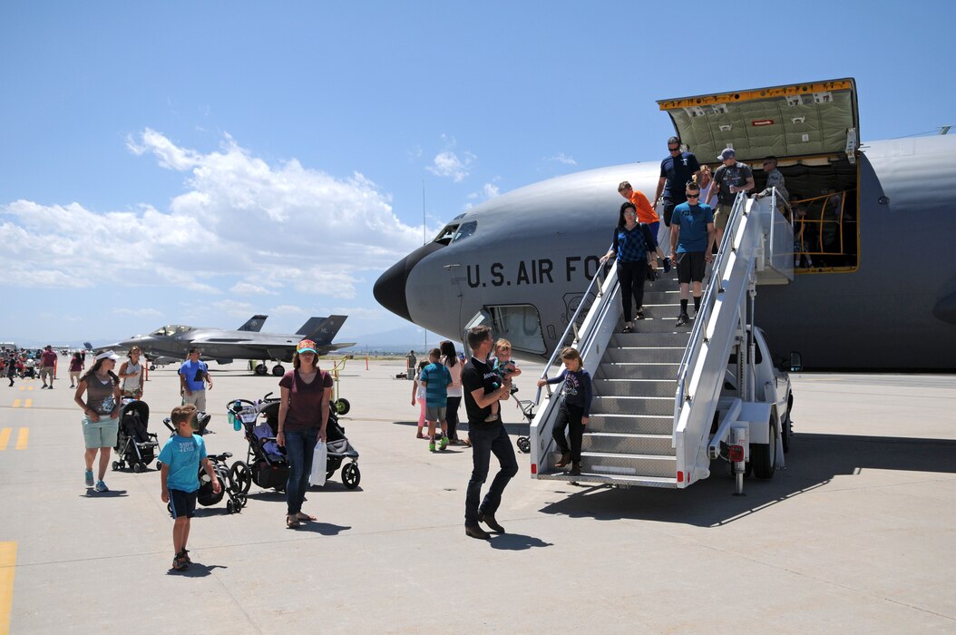 Utah Air National Guard Airmen and their families tour a KC-135R Stratotanker and view other static aircraft displays, including an F-16 Fighting Falcon and F-35 Lightning II from Hill Air Force Base, during Wingman Day on June 10, 2017 at Roland R. Wright Air National Guard Base in Salt Lake City. (U.S. Air National Guard photo by Tech. Sgt. Amber Monio)