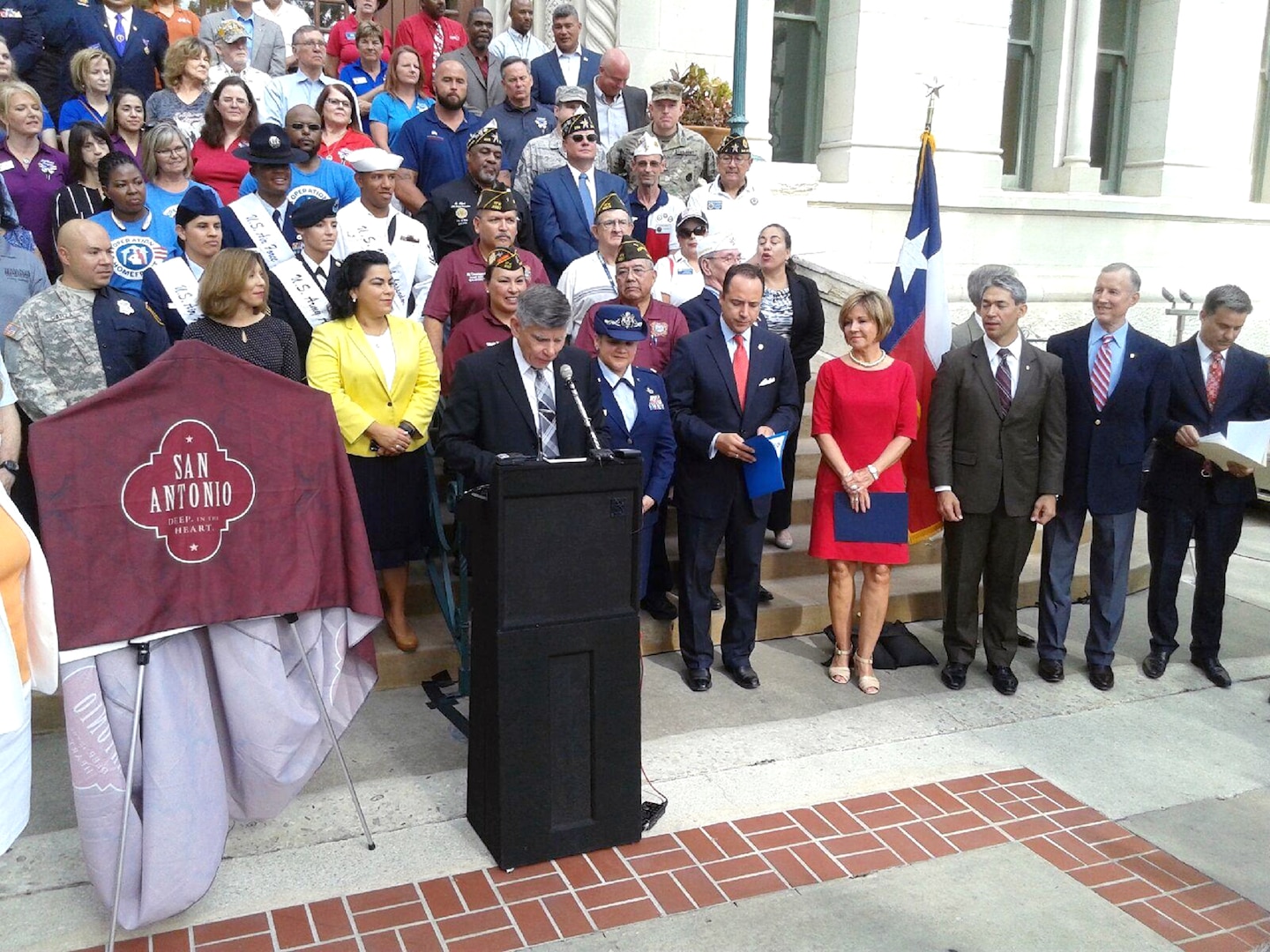 Retired Marine Corps Maj. Gen. Juan Ayala, director of the Office of Military Affairs for the City of San Antonio, speaks to those gathered for the unveiling ceremony for the newly trademarked Military City USA logo June 19 at City Hall. While the City of San Antonio has been known for years at “Military City USA,” it is now finally official as the city has trademarked the phrase and will start using it on logos and promotional material. 