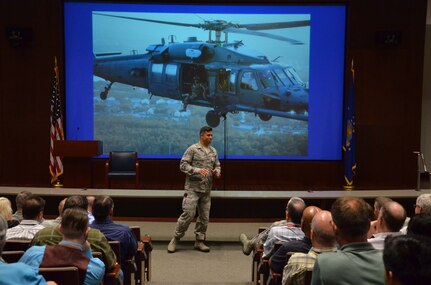 Staff Sgt. August O’Niell, an Air Force pararescueman, briefs members of the Air Force Technical Applications Center about how he sustained significant warzone injury, which led to the amputation of his leg, and how he overcame adversity during AFTAC’s Combat Airman Fitness Day May 22, 2017.  O’Niell is the first Air Force pararescue amputee on active duty today. (U.S. Air Force photo by Susan A. Romano)