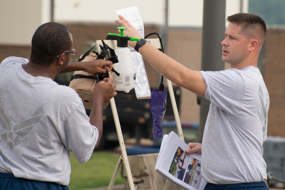 U.S. Air Force Reserve Senior Airman Joshua Pirtle (Left) and Tech. Sgt. David Underwood, aircrew flight equipment (AFE) technicians assigned to the 913th Operations Support Squadron, check the decontamination stations of an Aircrew Contamination Control Area (ACCA) June 15, 2017, at Little Rock Air Force Base, Ark. AFE ACCA provides augmentation in support of sustained aircrew chemical defense decontamination operations to include (ACCA) and related processing capabilities, deployable within 48 hours, in place within 72 hours and capable of mobile operation at Forward Operating Locations.