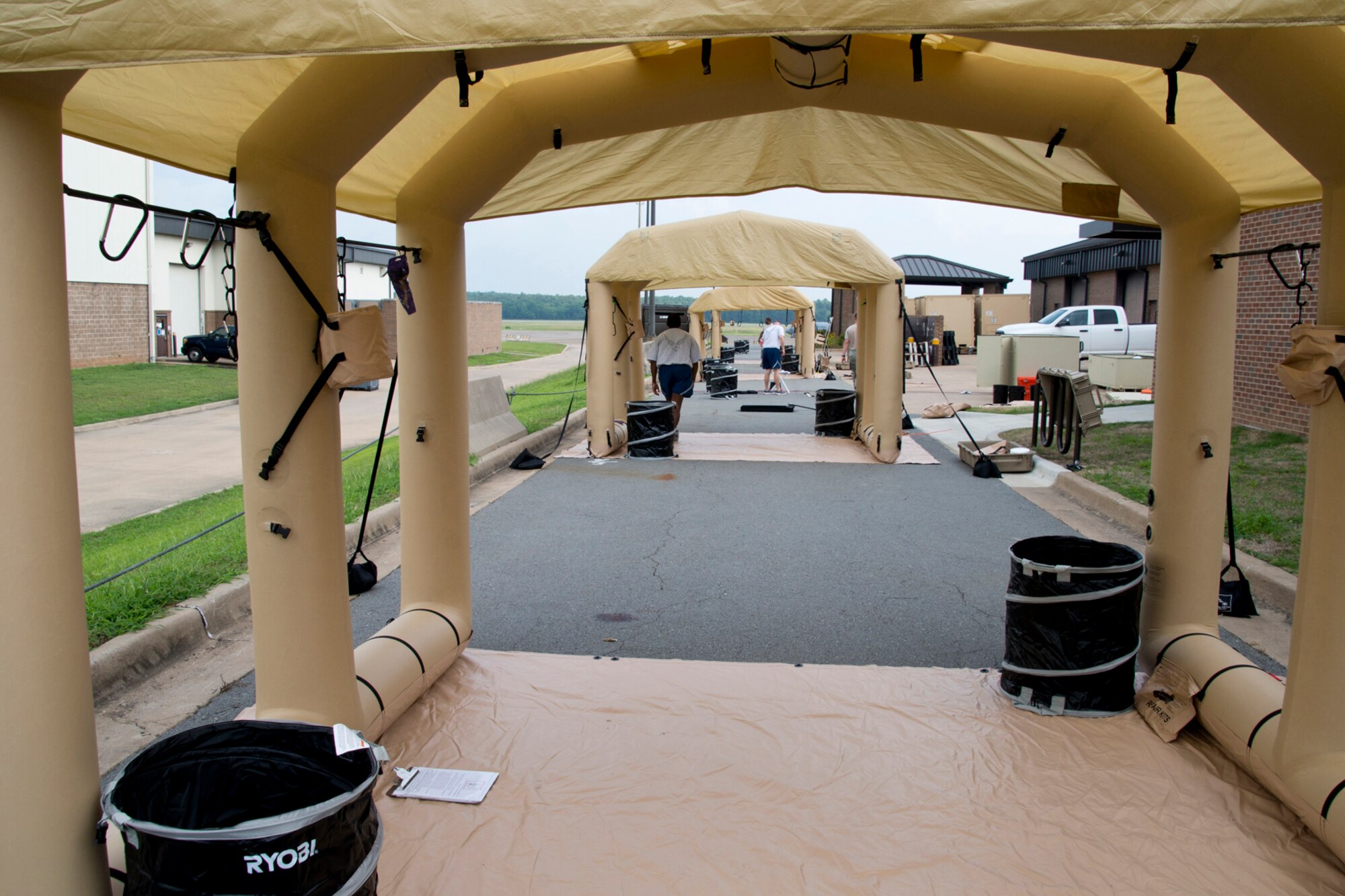 U.S. Air Force Reserve aircrew flight equipment technicians assigned to 913th Operations Support Squadron, construct an Aircrew Contamination Control Area (ACCA) June 15, 2017, at Little Rock Air Force Base, Ark. The purpose of the ACCA is to establish a location to provide detection, contamination control, and processing provisions for aircrew members (customers) into a toxic free environment. It is AFE’s responsibility to meet the operational requirements of the ACCA process in a Chemical Biological Radiological Nuclear (CBRN) environment. AFE procedures include recognizing vulnerabilities and opportunities to protect personnel, working safely and effectively in a contaminated environment, and understanding and operating and an ACCA (U.S. Air Force by Master Sgt. Jeff Walston/Released)