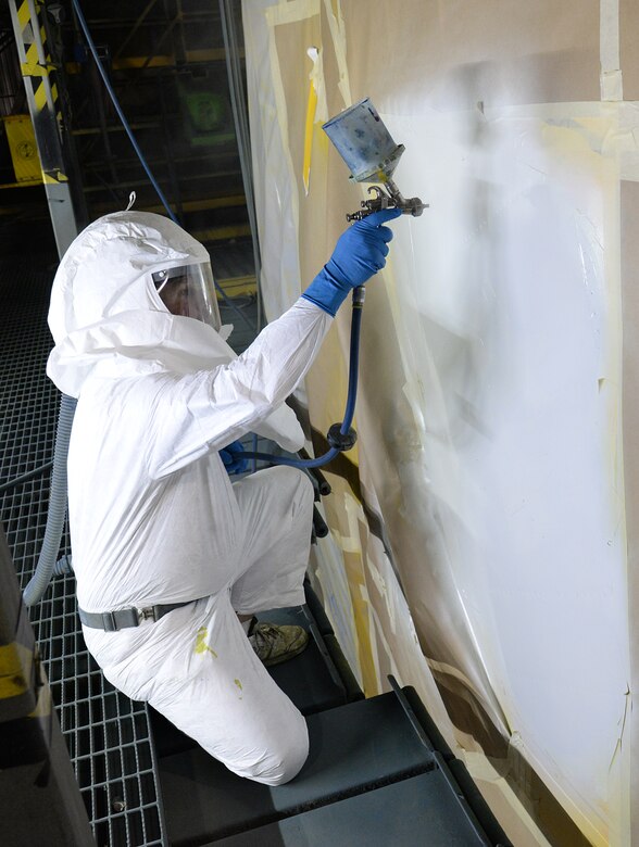 Fat Albert gets a paint application by 576th Aircraft Maintenance Squadron painter Jeffrey Burton on May 31 at Hill Air Force Base, Utah. (U.S. Air Force Photo by Alex R. Lloyd)
