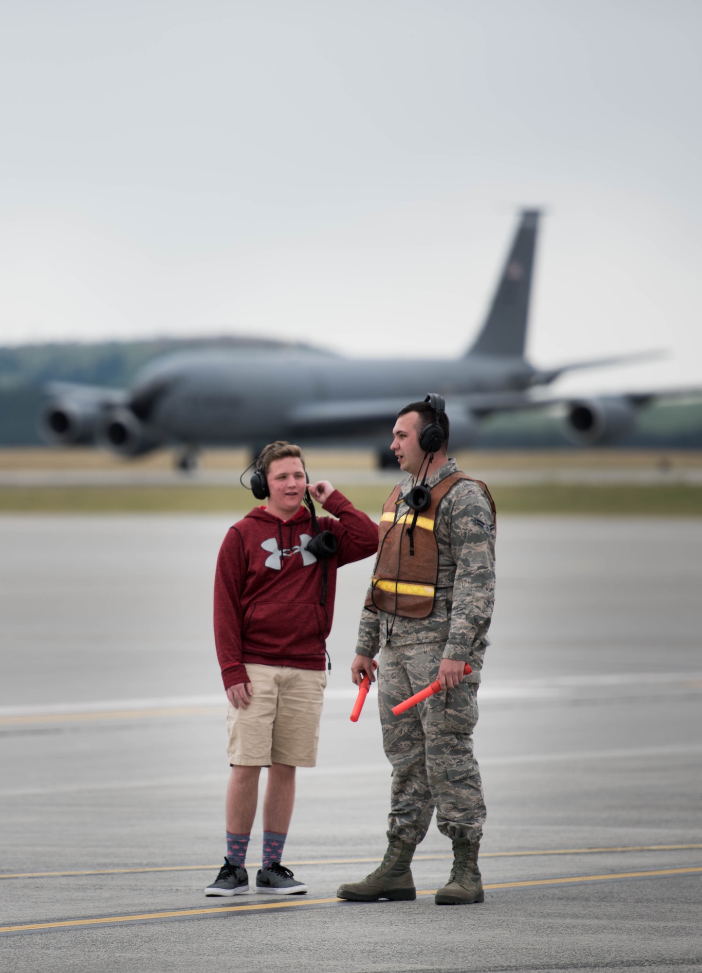 Matt Fritz, son of Col. Matthew Fritz, prepares to marshal in his father at the end of his final flight as vice commander of the 92nd Air Refueling Wing June 15, 2017, at Fairchild Air Force Base, Washington. Prior to his command assignment, Col. Fritz was the director of the National Assessment Group, Kirtland Air Force Base, New Mexico. (U.S. Air Force photo/Senior Airman Sean Campbell)