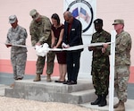 Completion of the new building at the Ladyville Health Clinic is officially marked at the ribbon-cutting ceremony June 9 in Ladyville, Belize. Shown cutting the ribbon (from left): Chief Warrant Officer 3 Herminio Romero, site project manager and member of the 448th Engineer Battalion from Puerto Rico; Col. John Simma, Beyond the Horizon 2017 Task Force Jaguar commander; Adrienne Galanek, Chargé d’Affaires for the U.S. Embassy Belize; Ramon Figueroa, CEO of the Belize Ministry of Health; Lance Cpl. Gladden of the Belize Defence Force and Lt. Col. Robert Ramsey, Senior Defense Official and Defense Attaché for the U.S. Embassy. Construction was accomplished during Beyond the Horizon 2017, a collaborative training event between U.S. Army South, the Belize Defence Force, other Central American nations and local and international NGOs, providing medical and engineering services throughout Belize. 