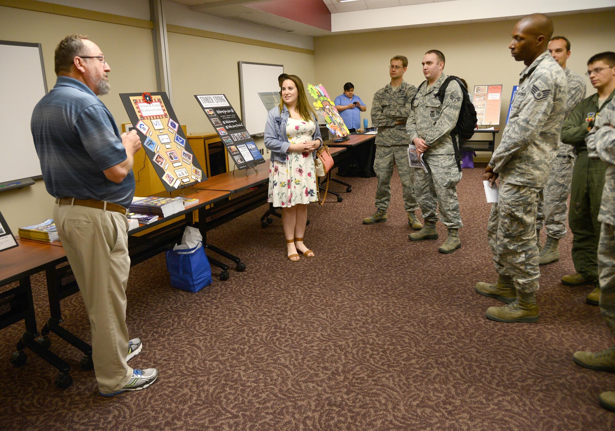 Glenn Grubis, with the Airman and Family Readiness Center, gives a brief rundown of 72nd Force Support Squadron services available during a Tinker Family Orientation class May 11. The class is held every two weeks at the Airman and Family Readiness Center in Bldg. 6001 and gives Active Duty Airmen who are new to Tinker helpful information about services, facilities and amenities available on base. An Information Fair is held for the second half of the class for Airmen, Sailors, civilians and family members, allowing attendees to meet representatives from numerous helping agencies and receive information on all of them. For more information about Tinker Family Orientation, contact the Airman and Family Readiness Center at 739-2747. (Air Force photo by Kelly White)