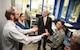 Lawrence Kingsley, deputy assistant secretary of the Air Force for Logistics and Product Support, Office of the Assistant Secretary of the Air Force for Acquisition, Headquarters, United States Air Force, center, receives an update on the 76th Propulsion Maintenance Group’s Clean Line from engineers Richard Renfro, left, and Julie Marasco, during his visit to Tinker Air Force Base May 23-26. During his visit, Kingsley was provided with an overall understanding of the Air Force Sustainment Center mission, to include discussions on readiness challenges to the Air Force enterprise, workload, capabilities and innovation. The Clean Line briefing takes a look at the process flow of an engine to determine how infrastructure investment benefits AFSC efficiencies, quality and safety. Looking on is Brig. Gen. Linda Marsh, mobilization assistant to the AFSC commander. (Air Force photo by Darren D. Heusel)