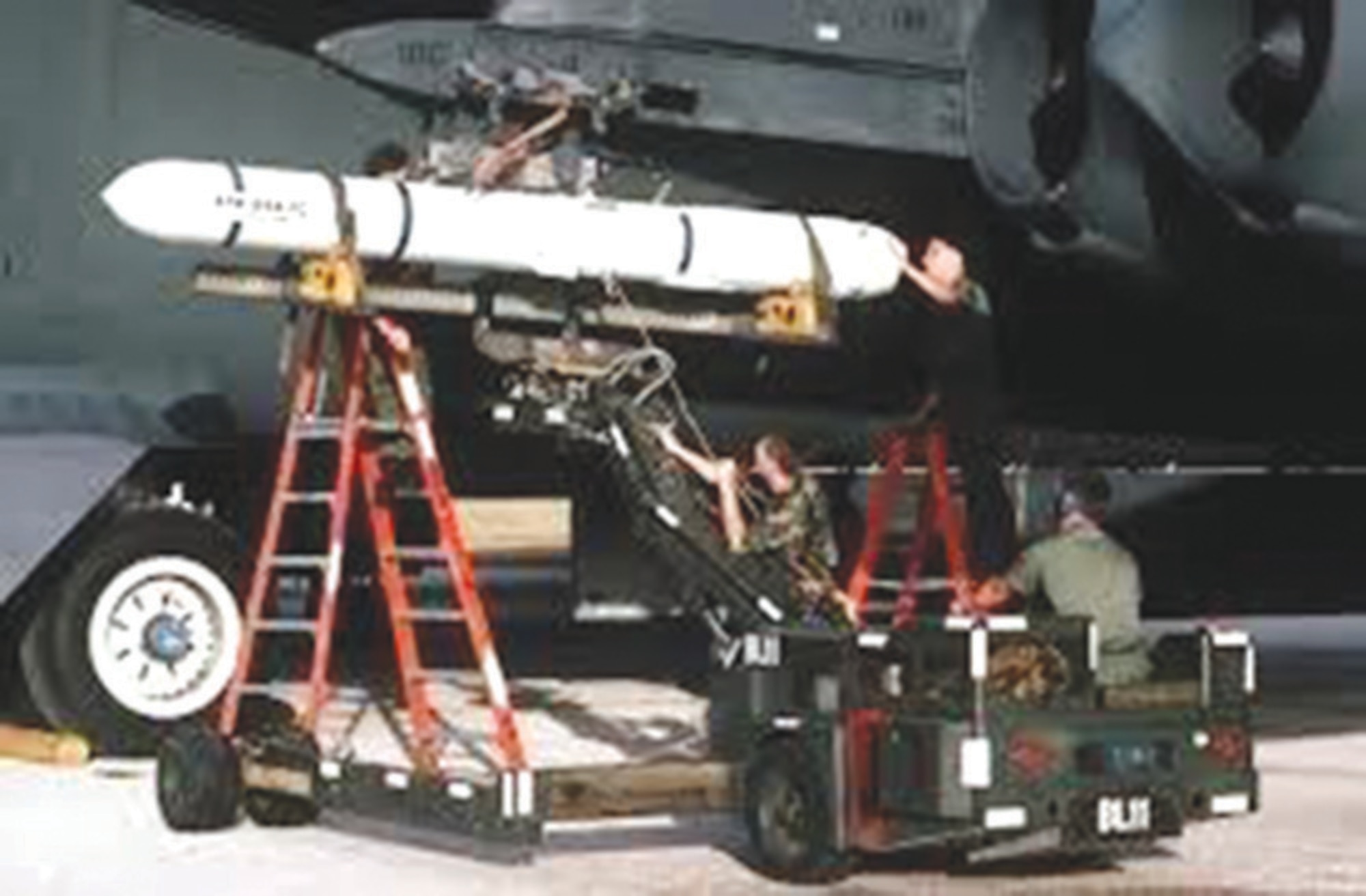 An AGM-84 Harpoon missile being loaded on a B-52. (Courtesy photo)