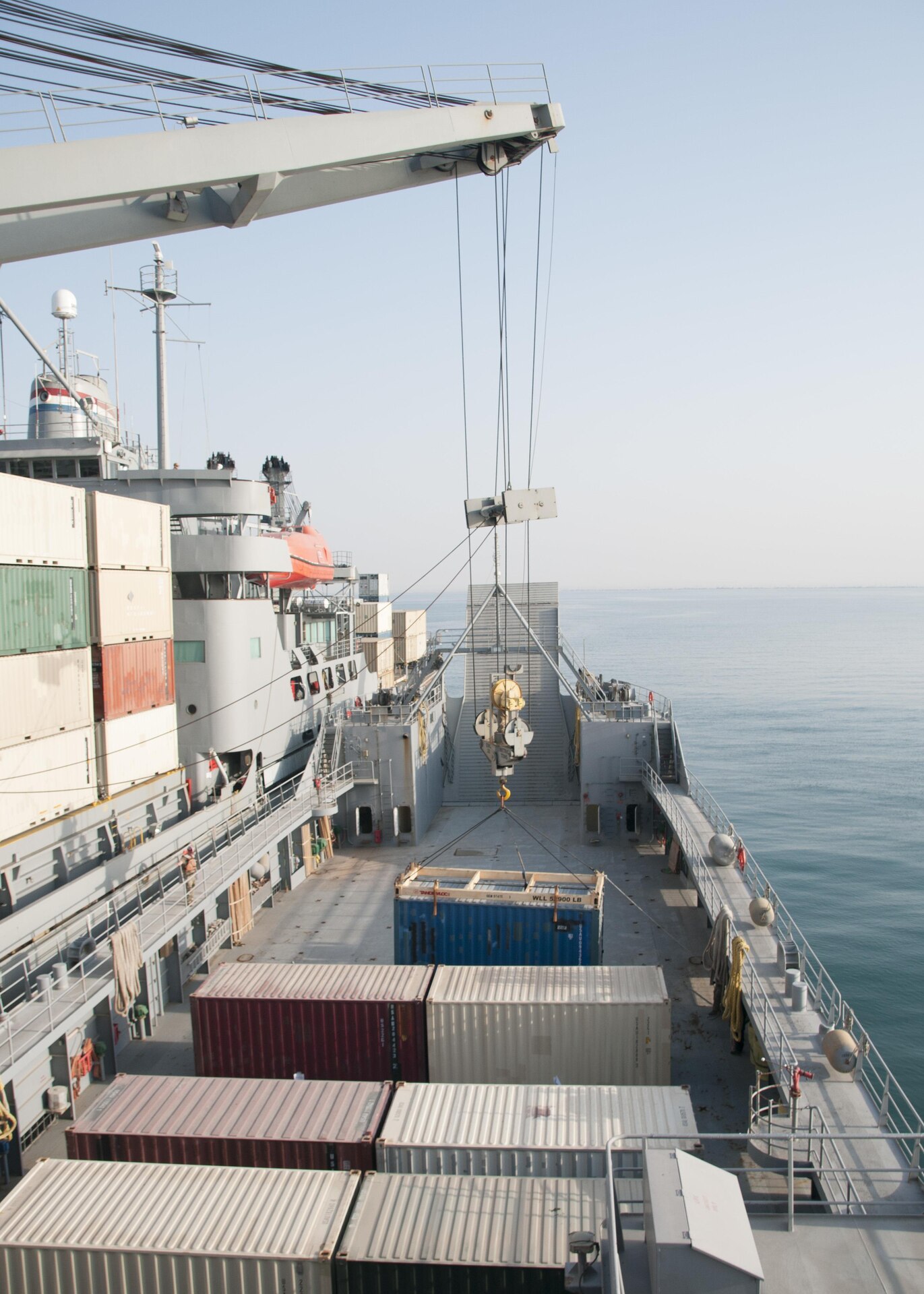 The Military Sealift Command Vessel Gem State transfers a container to the U.S. Army Watercraft Logistics Support Vessel 5 (LSV-5), “Maj. Gen. Charles P. Gross,” during an in-stream cargo transfer exercise in the Persian Gulf, on June 13, 2017. The vessels moved containers from one boat to the other using the Gem State’s crane, in order to demonstrate the LSV’s sustainment support capabilities. (U.S. Army photo by Sgt. Jeremy Bratt)