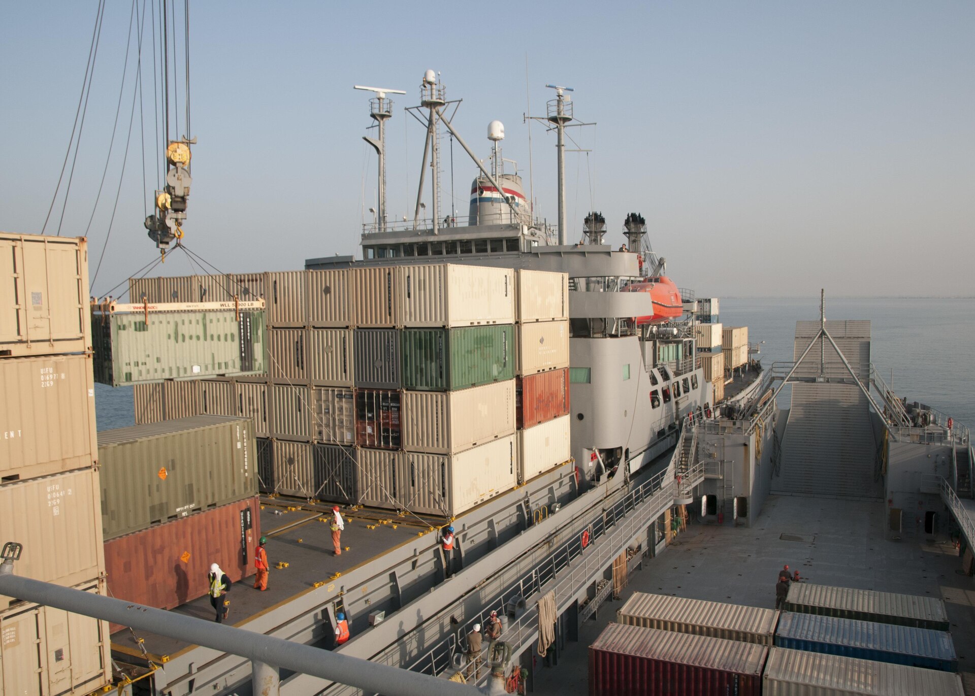The Military Sealift Command Vessel Gem State transfers a container to the U.S. Army Watercraft Logistics Support Vessel 5 (LSV-5), “Maj. Gen. Charles P. Gross,” during an in-stream cargo transfer exercise in the Persian Gulf, on June 13, 2017. The vessels moved containers from one boat to the other using the Gem State’s crane, in order to demonstrate the LSV’s sustainment support capabilities. (U.S. Army photo by Sgt. Jeremy Bratt)