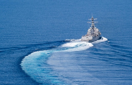 In this file photo, the Arleigh Burke-class guided-missile destroyer USS Dewey (DDG 105) transits the South China Sea. Dewey is part of the Sterett-Dewey Surface Action Group and is the third deploying group operating under the command and control construct called 3rd Fleet Forward, May 27, 2017. The U.S. 3rd Fleet operating forward offers additional options to the Pacific Fleet commander by leveraging the capabilities of 3rd and 7th Fleets. 
