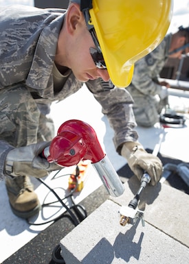 U.S. Air Force Airmen from the 210th Engineering Installation Squadron add an antenna to a newly installed Giant Voice stack located on the roof of the Small Air Terminal at the 133rd Airlift Wing in St. Paul, Minn., June 19, 2017. Once complete, the system will provide improved emergency notification capabilities to flight line and maintenance personnel while aircraft engines are running. Strobes will also light up on top of the stack as an added visual durning alerts.   
(U.S. Air National Guard photo by Tech. Sgt. Austen R. Adriaens/Released)