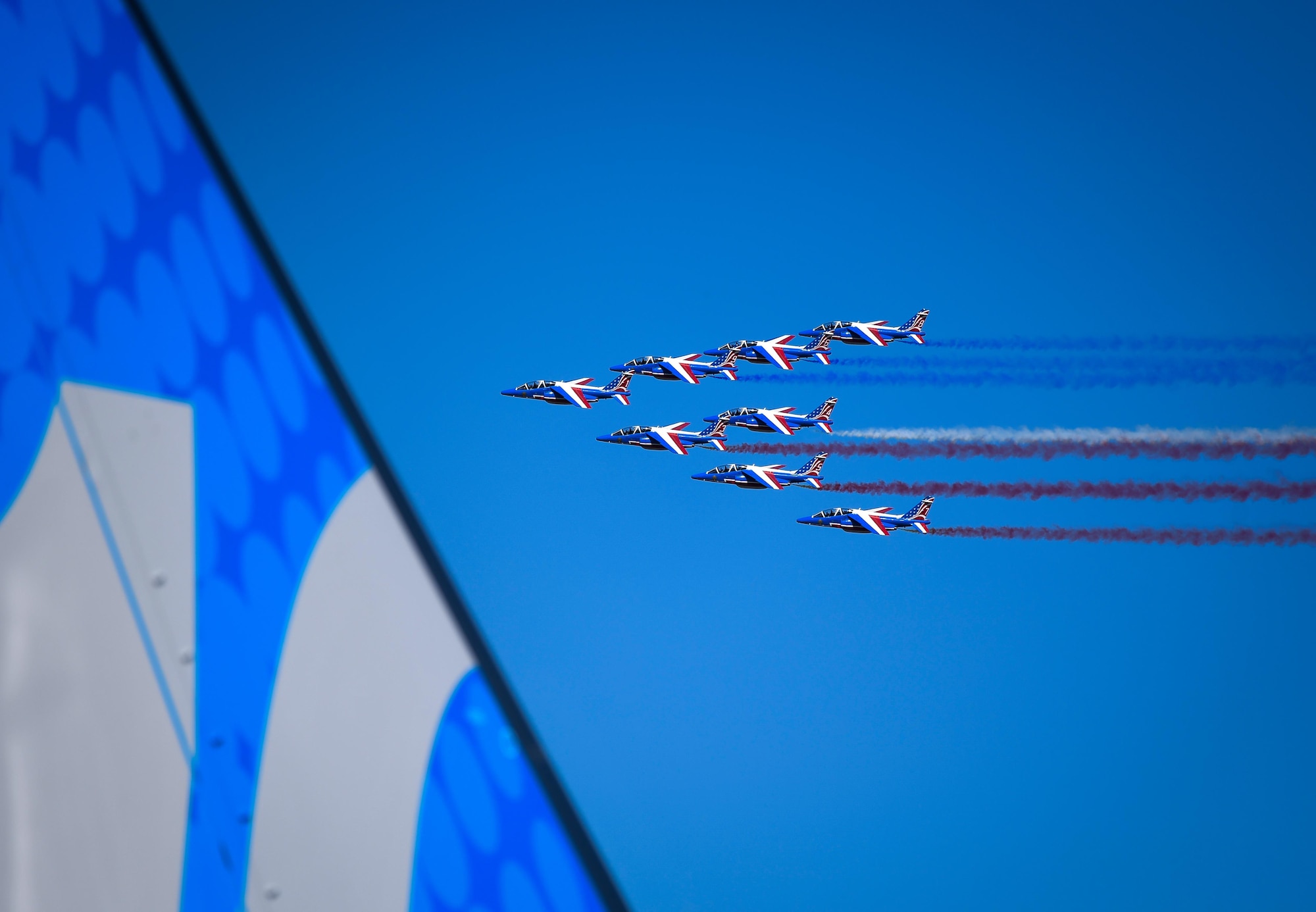 The Patrouille de France air demonstration team performs a flyby to signify the official start of the Paris Air Show June 19, 2017 at Le Bourget, France. Held every year, the Paris Air Show represents a unique opportunity for the United States to showcase its leadership in aerospace technologies. Direct participation in the air show supports U.S. government security policy and strategic defense objectives. (U.S. Air Force photo/ Tech. Sgt. Ryan Crane)