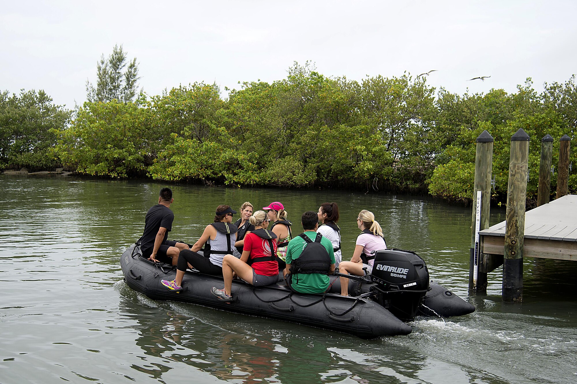 Spouses from Special Operations Command Central ride on a Zodiac, an inflatable boat, as part of Spartan Spouse Day held at MacDill Air Force Base, Fla., June 13, 2017. The day included inflatable-boat familiarization as an opportunity to experience the training their spouses have gone through. (U.S. Air Force photo by Airman 1st Class Caleb Nunez)