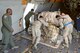 Tech. Sgt. Kenneth Cook, 6th Air Refueling Squadron, supervises KC-10 Extender loading operations at Travis Air Force Base, Calif., June 17, 2017. Cook oversaw the loading of more than 15,000 pounds of cargo prior to a flight to Joint Base Pearl Harbor-Hickam, Hawaii. (U.S. Air Force photo/Tech. Sgt. James Hodgman)