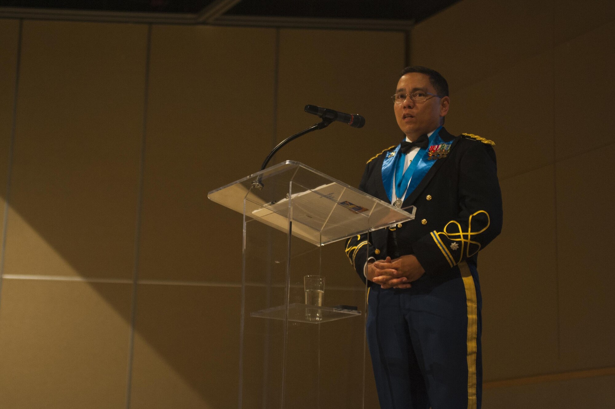 U.S. Army Lt. Col. Yukio Kuniyuki, 344th Military Intelligence Battalion Commander, gives remarks during the Army Ball at the McNease Convention Center San Angelo, Texas, June 16, 2017. Kuniyuki spoke on how important the heritage of the Army is and how far the force has come since its founding. (U.S. Air Force photo by Senior Airman Scott Jackson/Released)