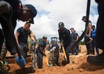 Sailors assigned to the Ticonderoga-class guided missile cruiser USS Lake Erie (CG 70) and the Sri Lankan marines rebuild a levee during support humanitarian assistance operations in response to severe flooding and landslides that devastated many regions of the country, June 13, 2017. 