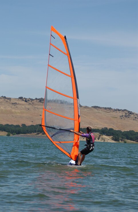 A wind-surfer heads out to catch an afternoon breeze on Black Butte Lake.