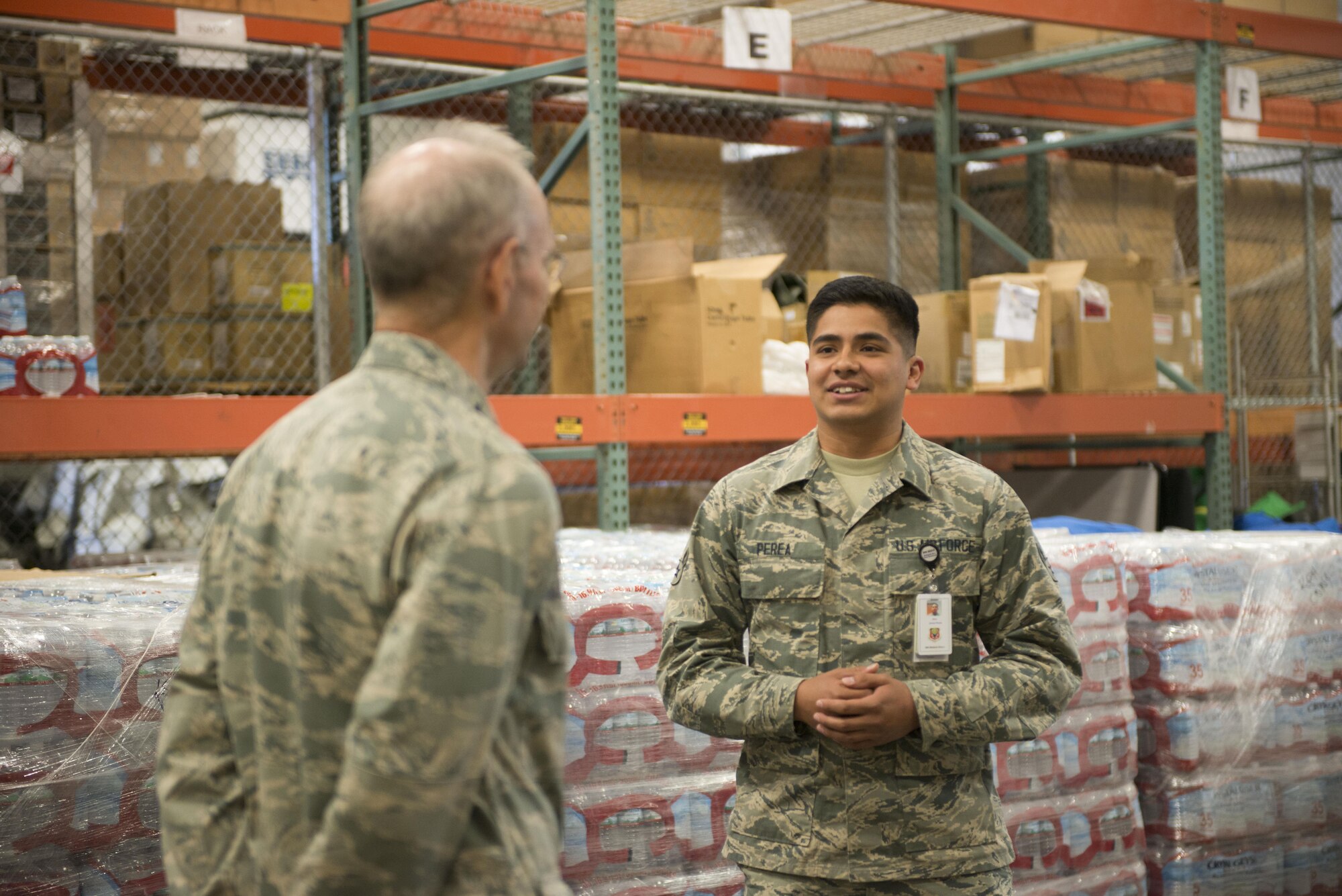 Airman 1st Class Josue Perea, 366th Aerospace Medicine journyman, briefs Lt. Gen. Mark Ediger, Air Force Surgeon General, during a visit to the 366 Medical Group, June 14, 2017, at Mountain Home Air Force Base, Idaho. Ediger visited various flights at the hospital during his visit. (U.S. Air Force photo by Senior Airman Malissa Lott/Released)
