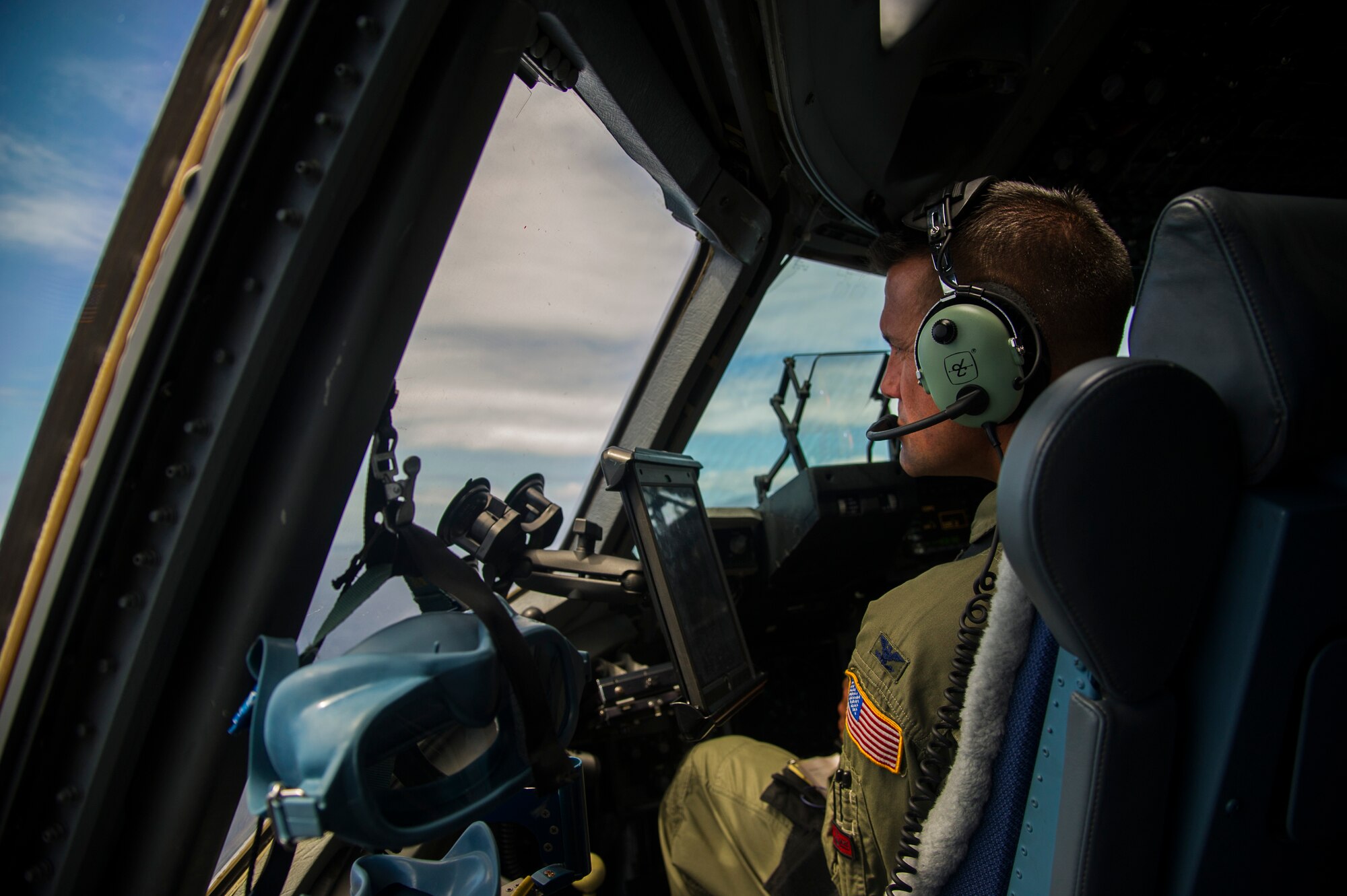 Col. Charles Velino, 15th Operations Group commander, flies a C-17 Globemaster III over the Hawaiian Islands during his final flight, June 16, 2017.  Velino is a command pilot with over 3,500 flying hours and will be leaving the 15th Operations Group to take command of the 47th Flying Training Wing in Laughlin AFB, Texas. (U.S. Air Force photo by Tech Sgt. Heather Redman)