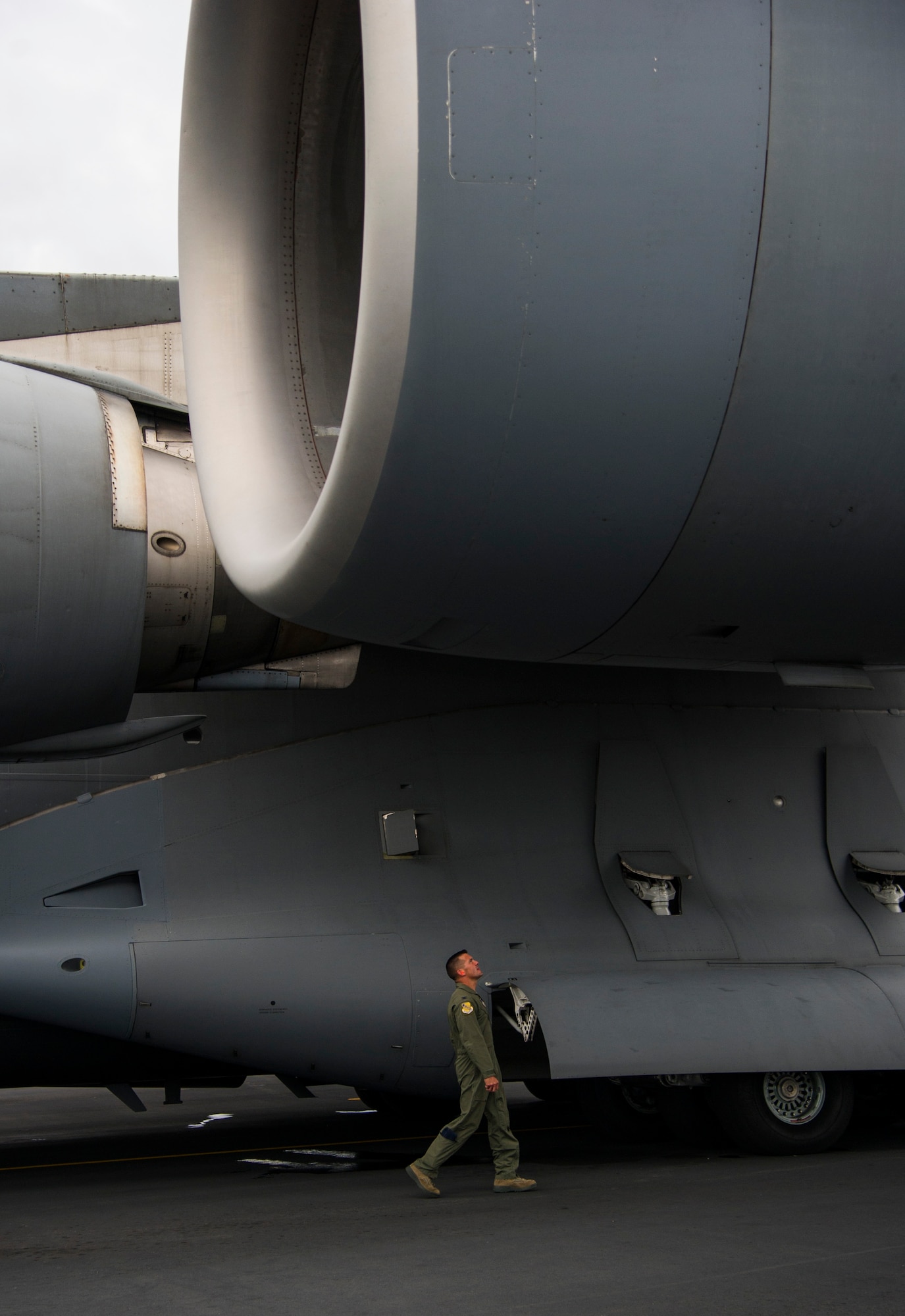 Col. Charles Velino, 15th Operations Group commander, does a pre-flight inspection of a C-17 Globemaster III before his final flight at Joint Base Pearl Harbor-Hickam, Hawaii, June 16, 2017.  Velino is a command pilot with over 3,500 flying hours and will be leaving the 15th Operations Group to take command of the 47th Flying Training Wing in Laughlin AFB, Texas. (U.S. Air Force photo by Tech Sgt. Heather Redman)