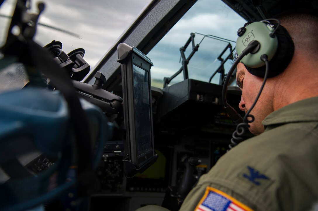 Col. Charles Velino, 15th Operations Group commander, flies a C-17 Globemaster III over the Hawaiian Islands during his final flight, June 16, 2017.  Velino is a command pilot with over 3,500 flying hours and will be leaving the 15th Operations Group to take command of the 47th Flying Training Wing in Laughlin AFB, Texas. (U.S. Air Force photo by Tech Sgt. Heather Redman)