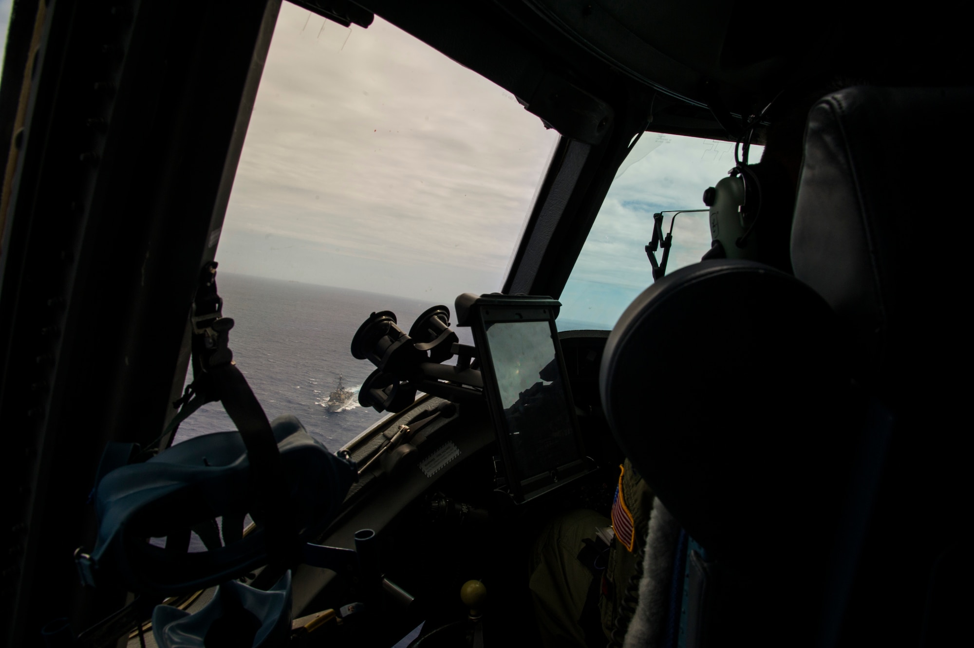 Col. Charles Velino, 15th Operations Group commander, flies a C-17 Globemaster III over the Hawaiian Islands during his final flight, June 16, 2017.  Velino is a command pilot with over 3,500 flying hours and will be leaving the 15th Operations Group to take command of the 47th Flying Training Wing in Laughlin AFB, Texas. (U.S. Air Force photo by Tech Sgt. Heather Redman)