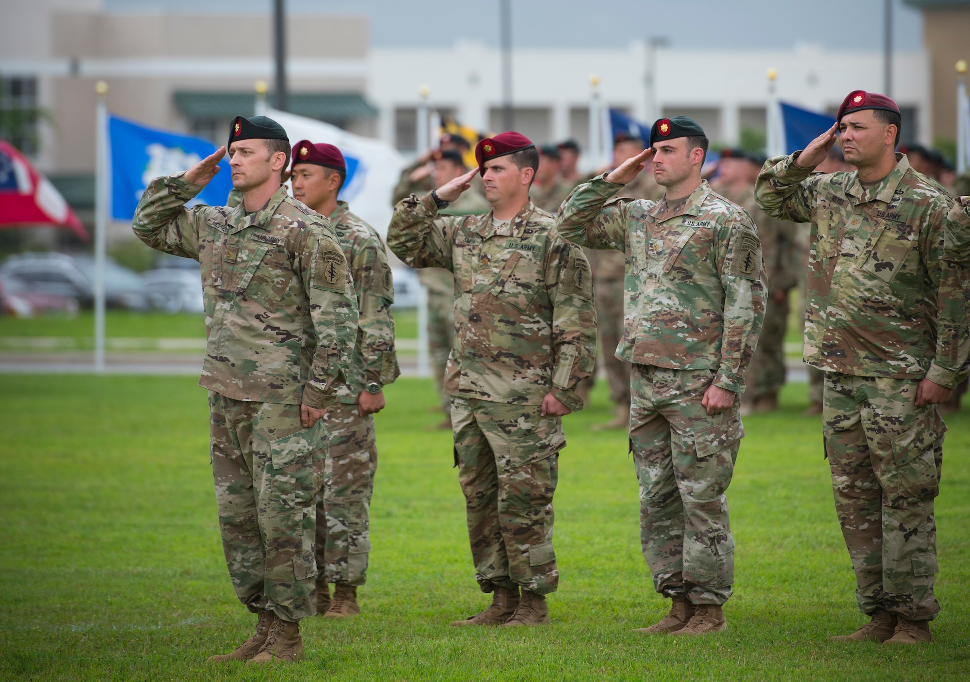 Soldiers of the 7th Special Forces Group (Airborne) salute during a change of command ceremony June 15 at Eglin Air Force Base, Fla. During the ceremony Col. Michael Ball relinquished command of the 7th SFG(A) to Col. Patrick Colloton. Colloton previously served as the 7th SFG(A) 1st Battalion commander. (U.S. Air Force photo/Ilka Cole)