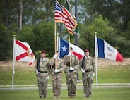 Soldiers of the 7th Special Forces Group (Airborne) present the colors during a change of command ceremony June 15 at Eglin Air Force Base, Fla. During the ceremony U.S. Army Col. Michael Ball relinquished command of the 7th SFG(A) to Col. Patrick Colloton. Colloton previously served as the 7th SFG(A) 1st Battalion commander. (U.S. Air Force photo/Ilka Cole) 