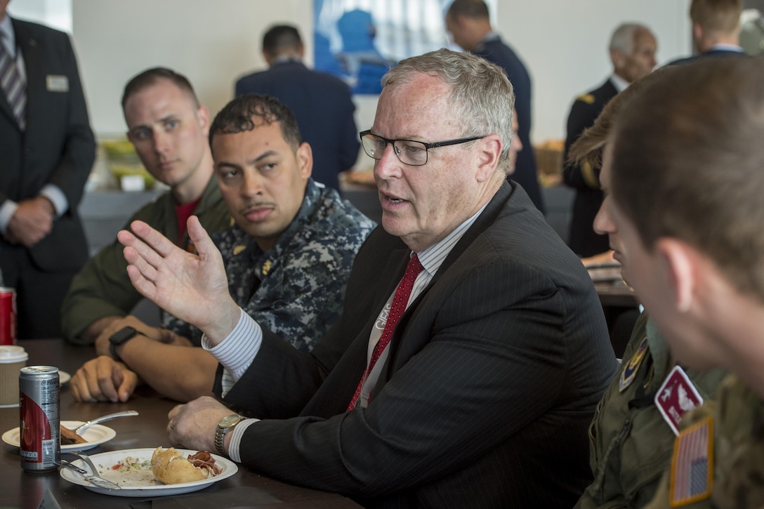 Deputy Defense Secretary Bob Work meets with U.S. troops working at the Paris Air Show, June 19, 2017. DoD photo by Air Force Tech. Sgt. Brigitte N. Brantley