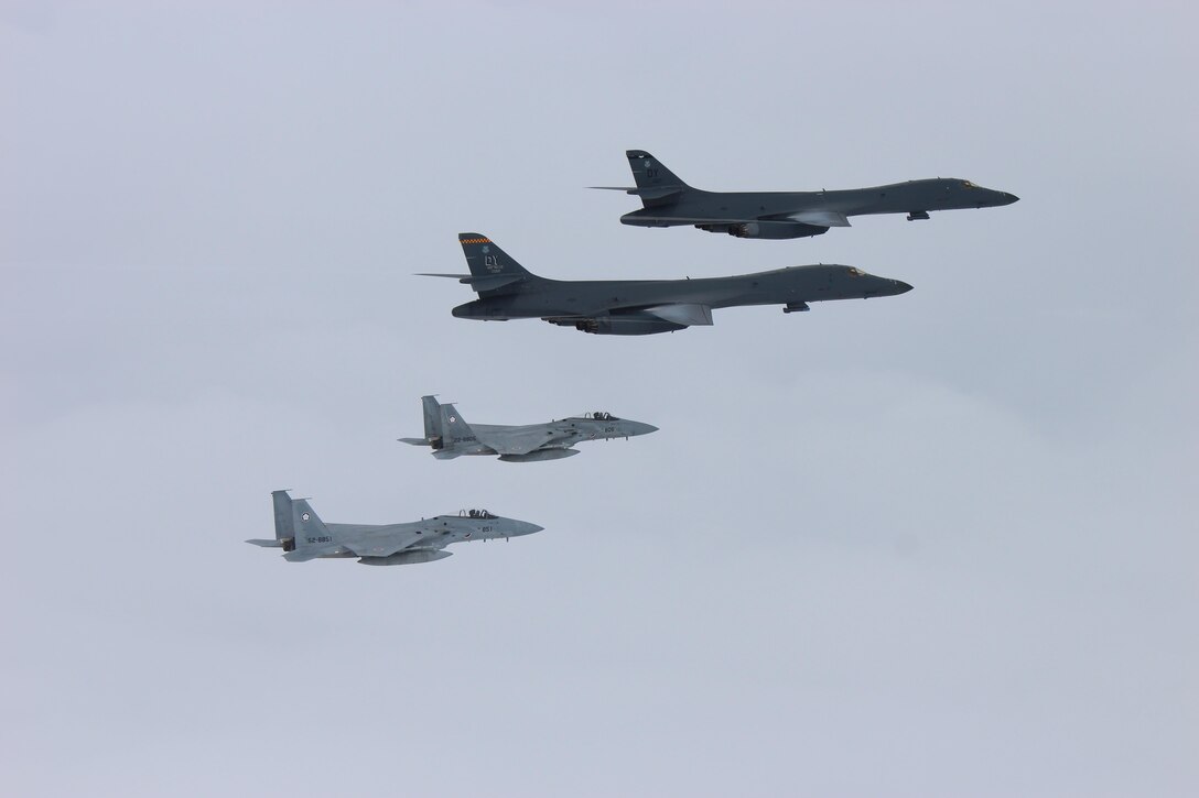 Two U.S. Air Force B-1B Lancers assigned to the 9th Expeditionary Bomb Squadron, deployed from Dyess Air Force Base, Texas, fly a 10-hour mission from Andersen Air Force Base, Guam, with two Japan Air Self-Defense Force F-15s in the vicinity of Kyushu, Japan, June 20, 2017. These sequenced flights with Japan demonstrate the solidarity and resolve we share with our allies to preserve peace and security in the Indo-Asia-Pacific. (Courtesy photo)