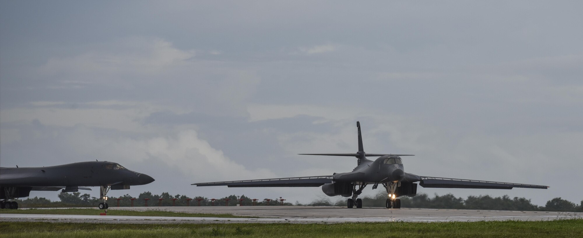 A U.S. Air Force B-1B Lancer aircraft assigned to the 9th Expeditionary Bomb Squadron, deployed from Dyess Air Force Base, Texas, takes off from Andersen Air Force Base, Guam, for a 10-hour mission, flying in the vicinity of Kyushu, Japan, the East China Sea, and the Korean peninsula, June 20, 2017. The normal/routine employment of continuous bomber presence (CBP) missions in the U.S. Pacific Command’s area of responsibility since March 2004 are in accordance with international law & are vital to the principles that are the foundation of the rules-based global operating system.  (U.S. Air Force photo/Tech. Sgt. Richard P. Ebensberger)