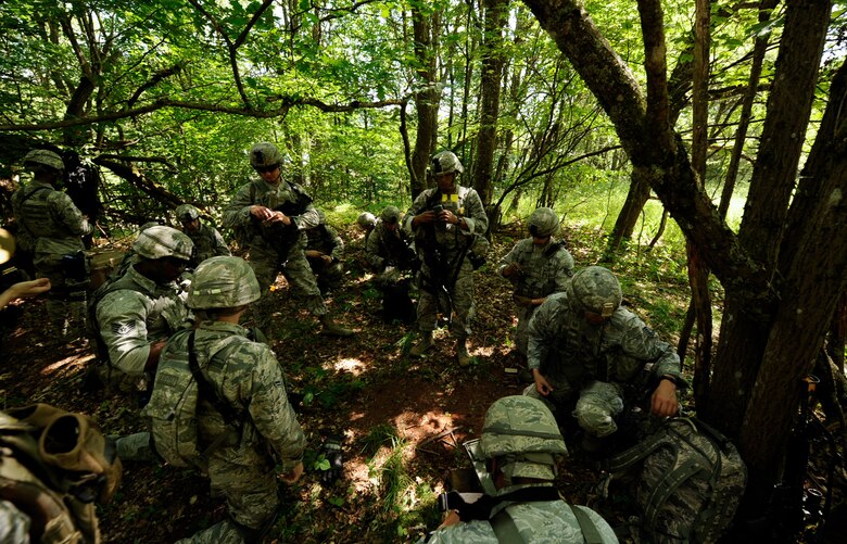 A 435th Security Forces Squadron’s Ground Combat Readiness Training Center Security Operations Course group load up their blank firing guns before a mission at U.S. Army Garrison Baumholder, Germany, June 15, 2017. Conducting missions together while being evaluated by the 435th SFS Instructor Cadre, students displayed knowledge of urban operations, close quarters combat, live firing iterations, mounted and dismounted patrols, entry control point operations, and counter improved-explosive device operations while at Baumholder. (U.S. Air Force photo by Airman 1st Class Savannah L. Waters)