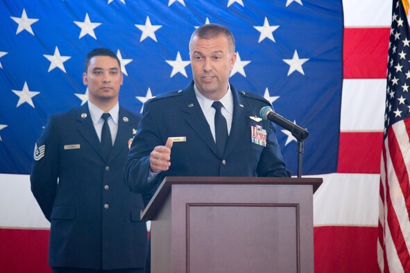 Lt. Col. Judd Baker addresses Airmen in the 43d Operations Support Squadron and other guests during the squadron's change-of-command ceremony here June 9. Baker took command of the 43d OSS from Lt. Col. Christopher Kiser, who left Pope for an assignment at Scott Air Force Base, Ill. (U.S. Air Force photo/Marc Barnes)