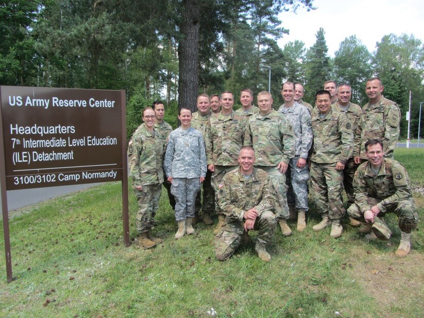 A group of the 42 U.S. Army field grade officers from various U.S.  Army commands and components pose after completing the Command and General Staff Officer Course, Common Core Course Phase III at Camp Normandy, United States Army Garrison, Bavaria on June 17, 2017. 