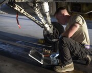Senior Airman Brandon Murdaugh, a 455th Expeditionary Aircraft Maintenance Squadron crew chief, reviews a technical order at Bagram Airfield, Afghanistan, June 16, 2017. A technical order provides guidance and step-by-step instructions on how to conduct certain maintenance procedures. (U.S. Air Force photo by Staff Sgt. Benjamin Gonsier) 
