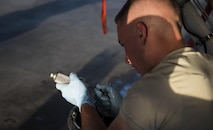Senior Airman Brandon Murdaugh, a 455th Expeditionary Aircraft Maintenance Squadron crew chief, inspects a constant speed drive filter before installing it on an F-16 Fighting Falcon at Bagram Airfield, Afghanistan, June 16, 2017. CSDs are mainly used on airliner and military aircraft jet engines to drive the alternating current electrical generator. (U.S. Air Force photo by Staff Sgt. Benjamin Gonsier) 