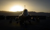 An F-16 Fighting Falcon, belonging to the 555th Expeditionary Fighter Squadron, sits on the ramp as 455th Expeditionary Aircraft Maintenance Squadron Airmen work on it at Bagram Airfield, Afghanistan, June 16, 2017. The 555th EFS, deployed out of Aviano Air Base, Italy, conducts counterterrorism operations which enable Resolute Support’s train, advise, and assist campaign. (U.S. Air Force photo by Staff Sgt. Benjamin Gonsier) 