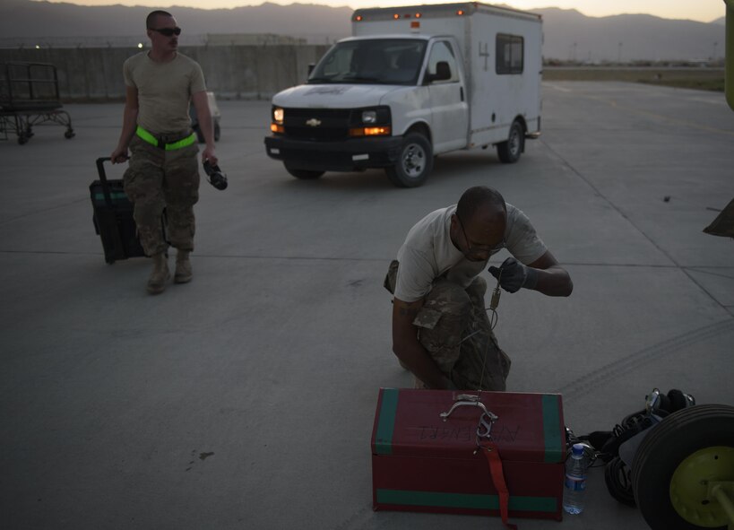 Staff Sgt. Donterrio Erby, a 455th Expeditionary Aircraft Maintenance Squadron aerospace propulsion technician, puts equipment away before performing an engine run at Bagram Airfield, Afghanistan, June 16, 2017. Aerospace propulsion technicians diagnose engine problems, which includes the fuel, oil, electrical and engine airflow systems, and recommends a course of action on how to fix them. Erby is a native of Columbus, Mississippi. (U.S. Air Force photo by Staff Sgt. Benjamin Gonsier) 