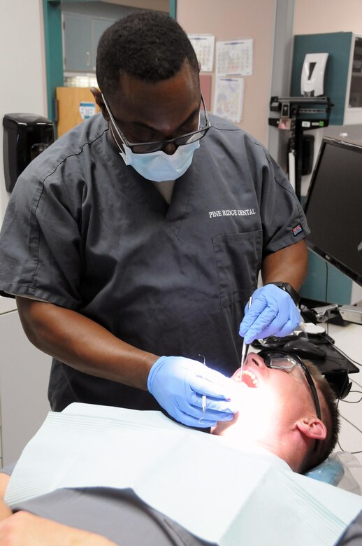 Capt. Carlos Alexander, a general dentist assigned to Army Reserve Medical Command’s 7240th Medical Support Unit out of Kirksville, Missouri, is one of approximately 25 U.S. Army Reserve Soldiers who are working in partnership with Pine Ridge Indian Health Service to provide medical care to the local tribal population. The Indian Health Service provides preventive, curative, and community health care for approximately 2.2 million American Indians and Alaska Natives in hospitals, clinics, and other settings throughout the United States.