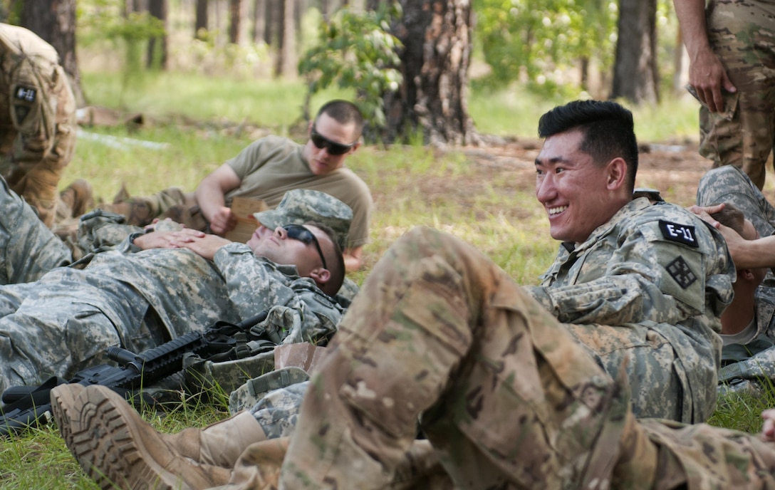 Spc. Wantae Seong (right), a carpentry and masonry specialist representing the 412th Theater Engineer Command, rests between events during the 2017 U.S. Army Reserve Best Warrior Competition at Fort Bragg, N.C. June 14. This year’s Best Warrior Competition will determine the top noncommissioned officer and junior enlisted Soldier who will represent the U.S. Army Reserve in the Department of the Army Best Warrior Competition later this year at Fort A.P. Hill, Va. (U.S. Army Reserve photo by Sgt. David Turner) (Released)