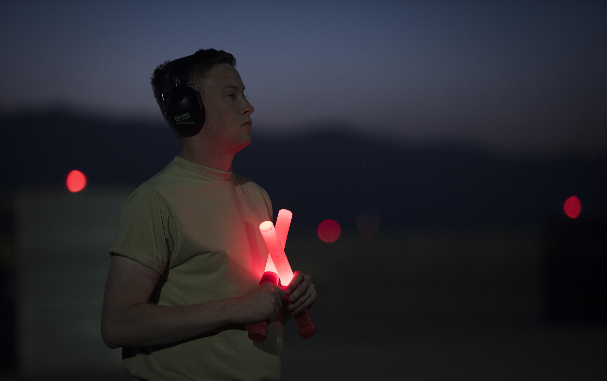 Airman 1st Class Michael Smothers, a 455th Expeditionary Aircraft Maintenance Squadron weapons load crew member, holds an F-16 Fighting Falcon in place at Bagram Airfield, Afghanistan, June 16, 2017. Smothers is deployed out of Aviano Air Base, Italy, and is a native of Oklahoma City, Oklahoma. (U.S. Air Force photo by Staff Sgt. Benjamin Gonsier) 