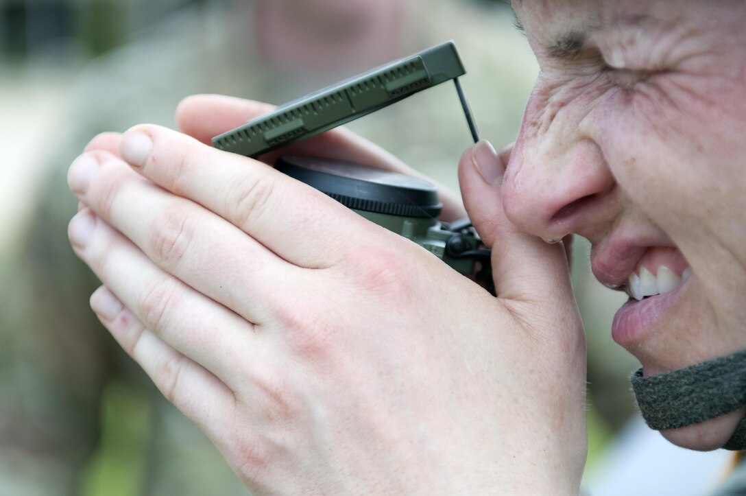 A Warrior uses a compass to plot coordinates during the combat skills testing event at the 2017 U.S. Army Reserve Best Warrior Competition at Fort Bragg, N.C. June 14. This year’s Best Warrior Competition will determine the top noncommissioned officer and junior enlisted Soldier who will represent the U.S. Army Reserve in the Department of the Army Best Warrior Competition later this year at Fort A.P. Hill, Va. (U.S. Army Reserve photo by Sgt. Jennifer Shick) (Released)