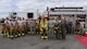 Royal Air Force Firefighters and U.S. Air Force Airmen stand together after a medical exercise at Royal Air Force Fairford, U.K., June 13, 2017. Exercises involving multiple departments provide opportunities to increase interoperability and readiness. (U.S. Air Force photo by Airman 1st Class Randahl J. Jenson)