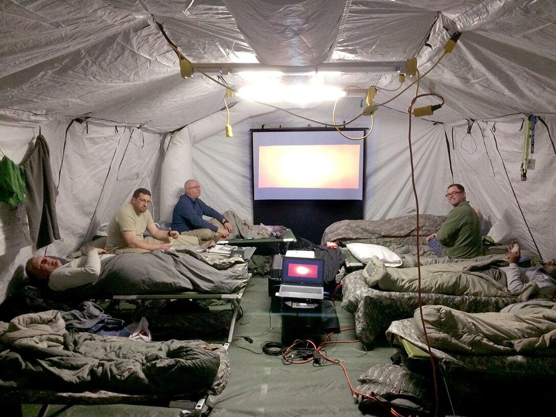 Black Team members (L-R) Taylor Frazier, Craig Hill and Robert Seekamp retire in their tent during Turbo Distribution Exercise 16-2.