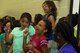 Children dance as Olympic Day begins in the Youth Center during Olympic Week, June 15. 2017, at Moody Air Force Base, Ga. The Youth Center’s annual Olympic Week hosted a variety of different events such as sack races, and hula-hooping, with the goal of promoting unity and healthy lifestyles. (U.S. Air Force Photo by Airman 1st Class Erick Requadt)
