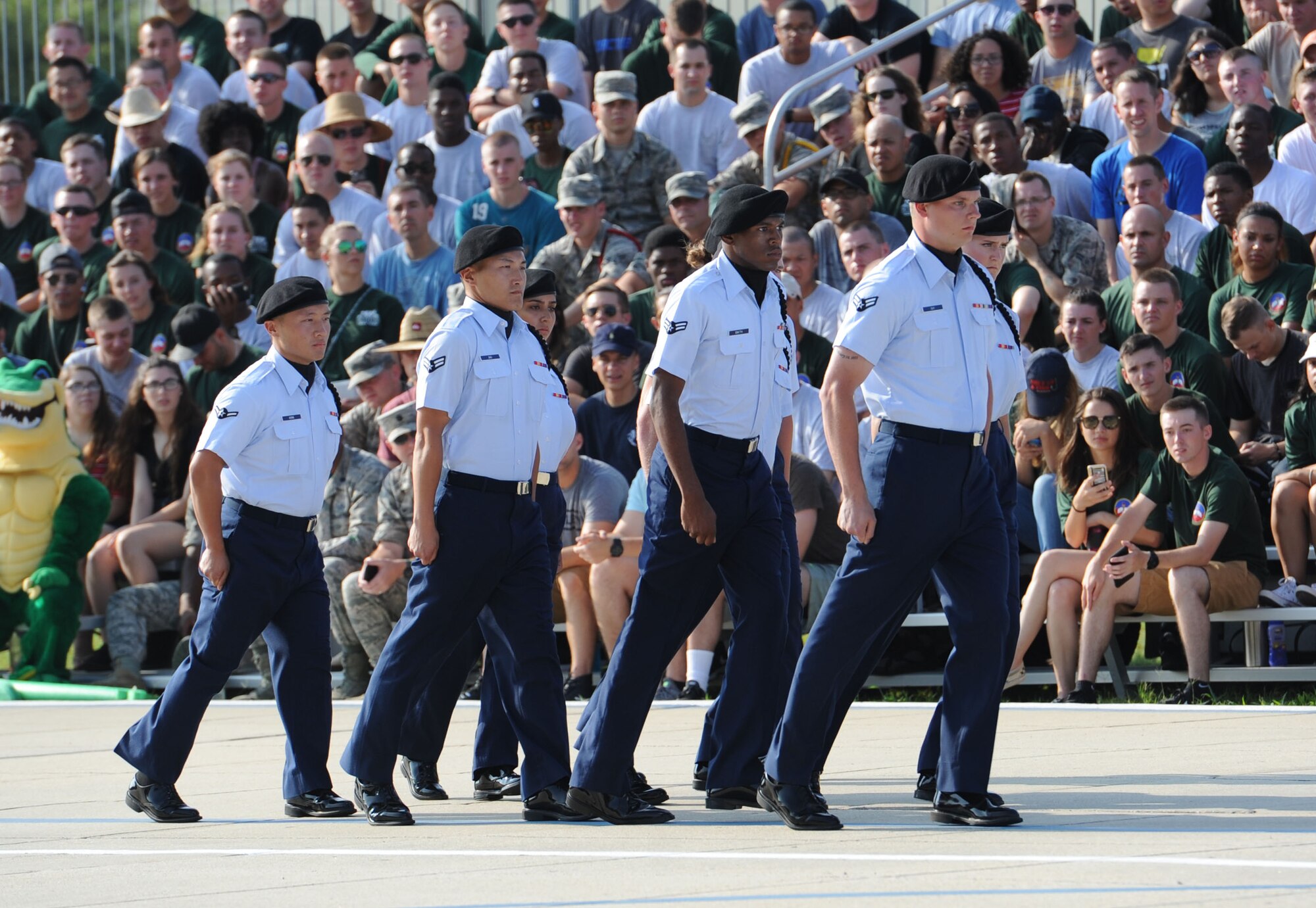 Members of the 338th Training Squadron regulation drill team perform during the 81st Training Group drill down on the Levitow Training Support Facility drill pad June 16, 2017, on Keesler Air Force Base, Miss. Airmen from the 81st TRG competed in a quarterly open ranks inspection, regulation drill routine and freestyle drill routine. The 334th TRS “Gators” took first place this quarter. (U.S. Air Force photo by Kemberly Groue)