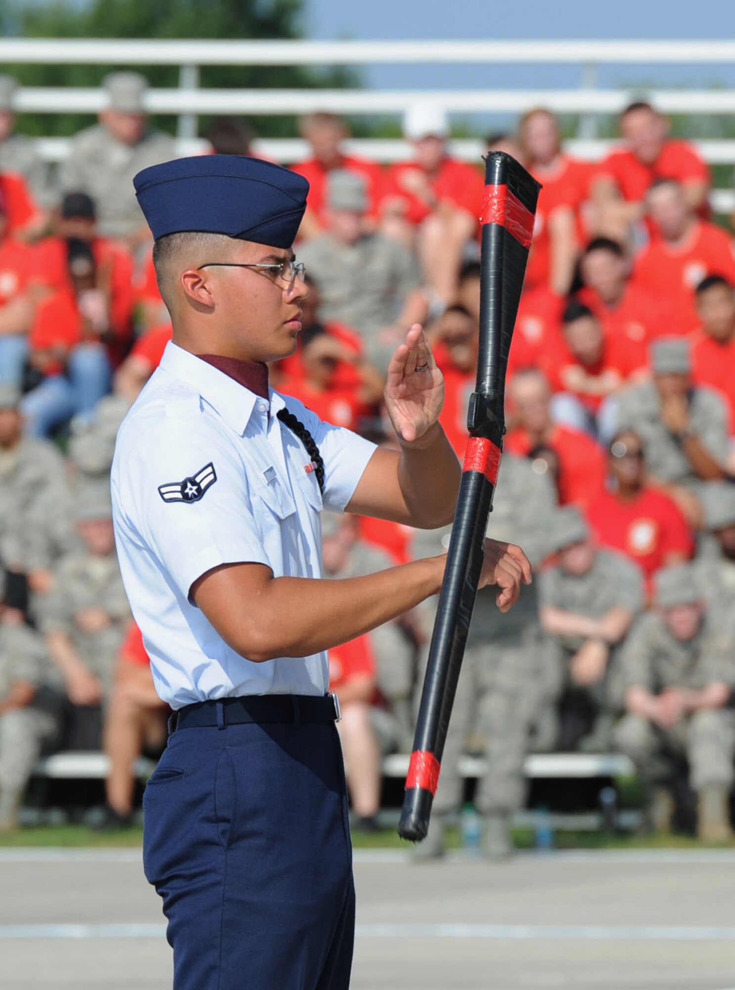 Airman 1st Class Jager Munsell, 335th Training Squadron freestyle drill team drillmaster, spins a rifle during the 81st Training Group drill down at the Levitow Training Support Facility drill pad June 16, 2017, on Keesler Air Force Base, Miss. Airmen from the 81st TRG competed in a quarterly open ranks inspection, regulation drill routine and freestyle drill routine. The 334th TRS “Gators” took first place this quarter. (U.S. Air Force photo by Kemberly Groue)
