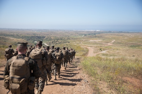 U.S. Marines with Combat Logistics Battalion 5, Combat Logistics Regiment 1, 1st Marine Logistics Group participate in a six mile conditioning hike on Camp Pendleton, Calif., June 16, 2017. The Marines have four conditioning hikes to prepare for Mountain Exercise 4-17 which will be conducted on the Marine Corps Mountain Warfare Training Center in Bridgeport, Calif. (U.S. Marine Corps photo by Lance Cpl. Timothy Shoemaker)